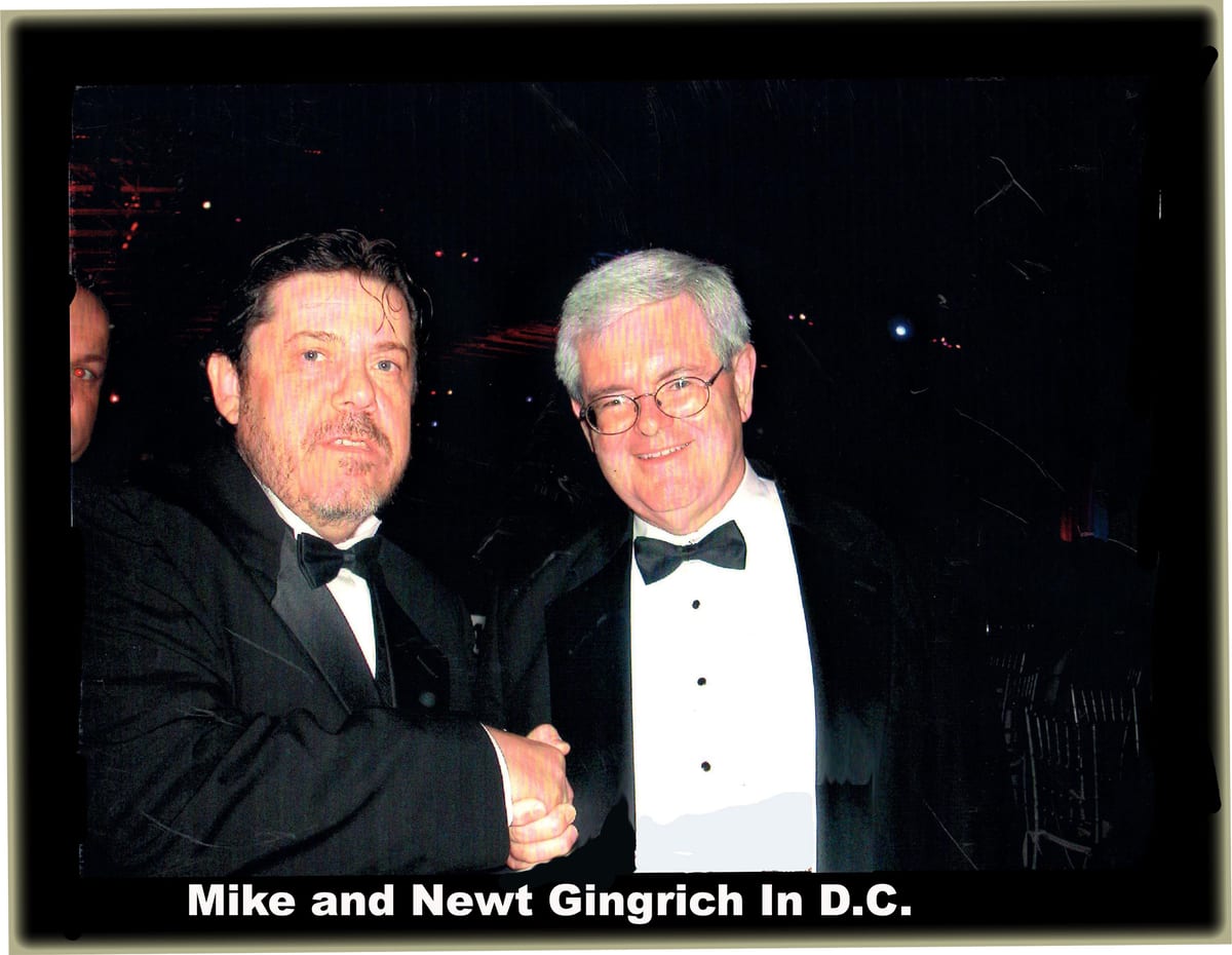 Two men in black tie shaking hands at an evening event, captioned Mike and Newt Gingrich in D.C.